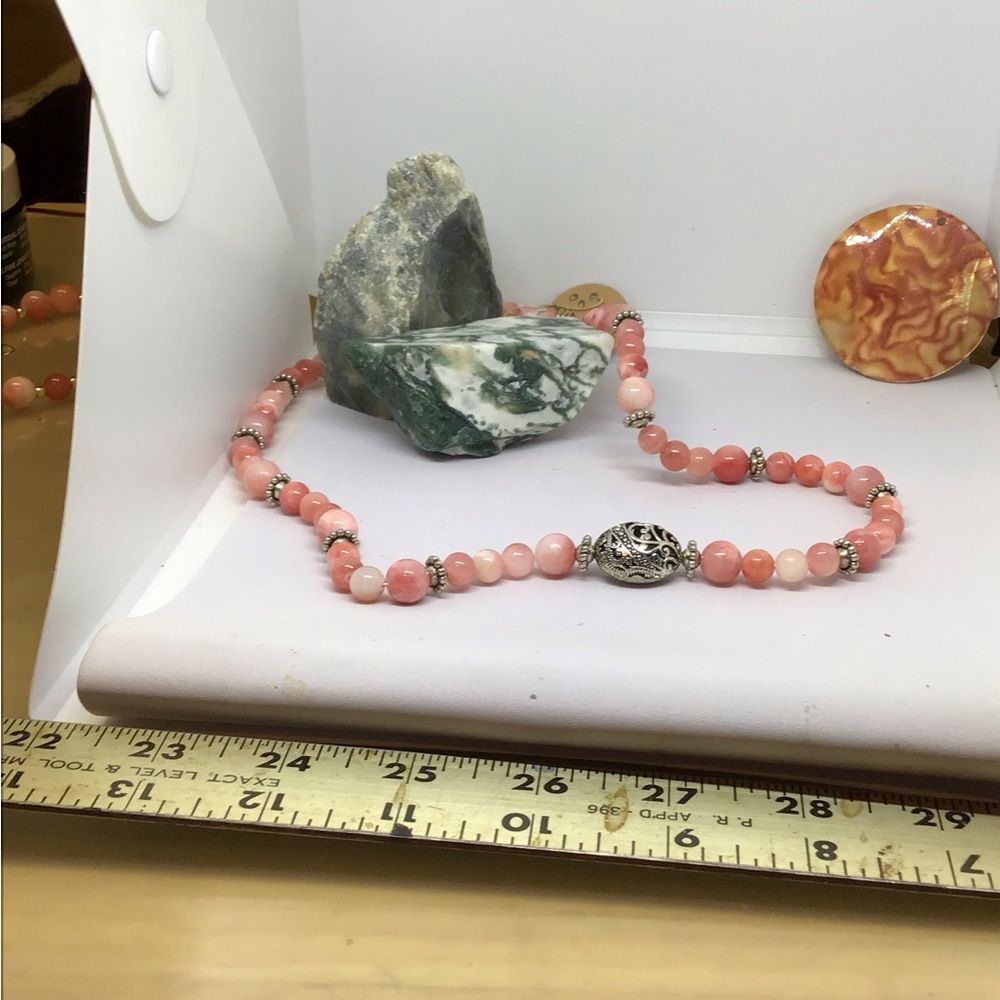 Pink and creamy stone beads necklace.